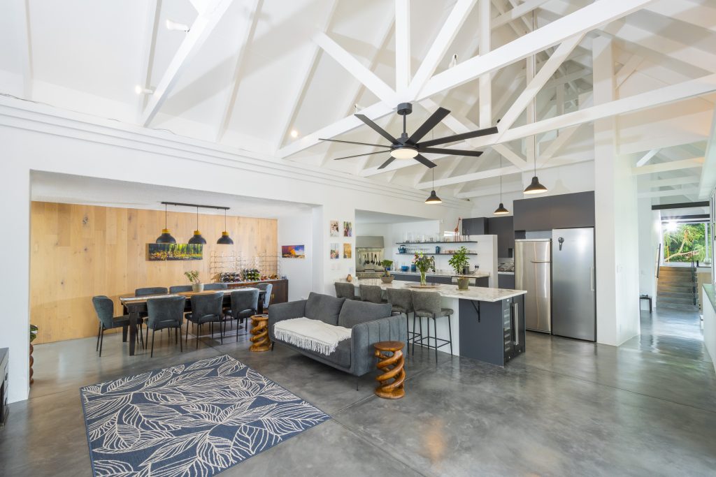 Angus5 Open-plan living, dining and kitchen with polished concrete floors after renovation, Benmore Gardens